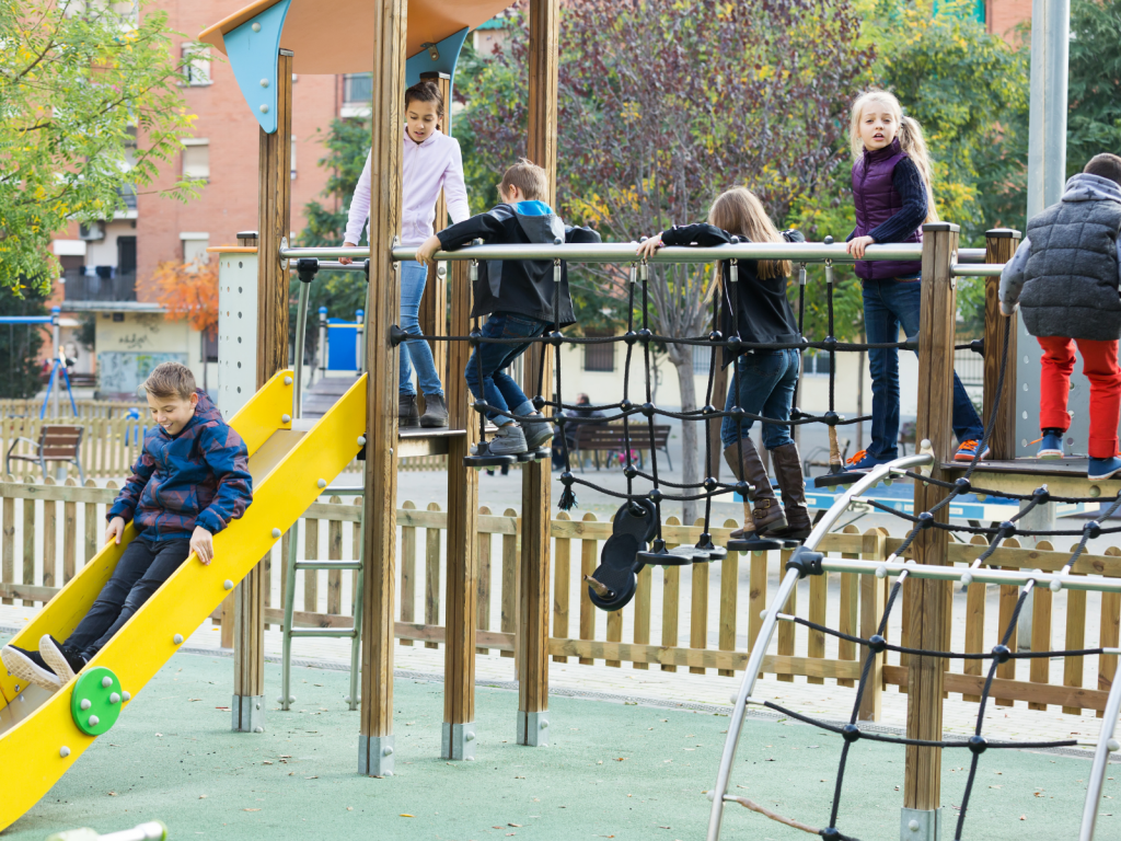 How can an outdoor playground help in children’s growth?